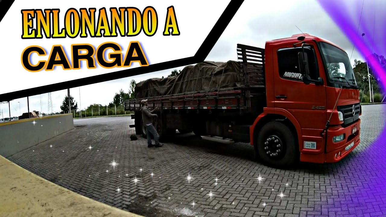 ENLONAMENTO DE CARGA DE CAMINHÃO COM LONA ENCERRADA .
