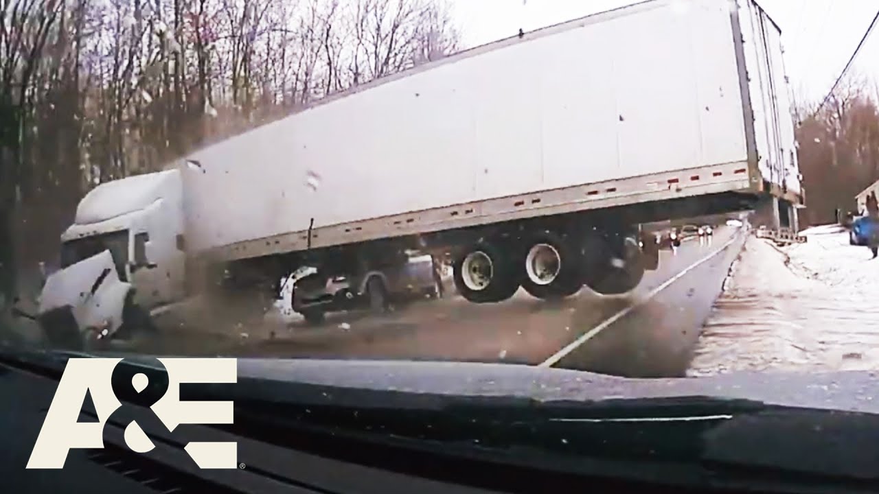 Semi-Truck Jackknifes into Two Cars On Icy Road | Road Wars | A&E