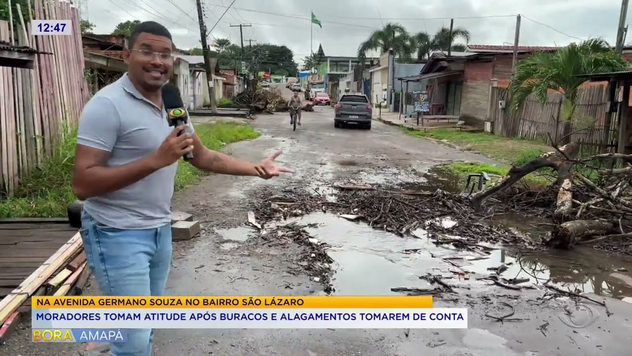 Moradores tomam atitude após buracos e alagamentos tomarem conta de avenida no bairro São Lázaro