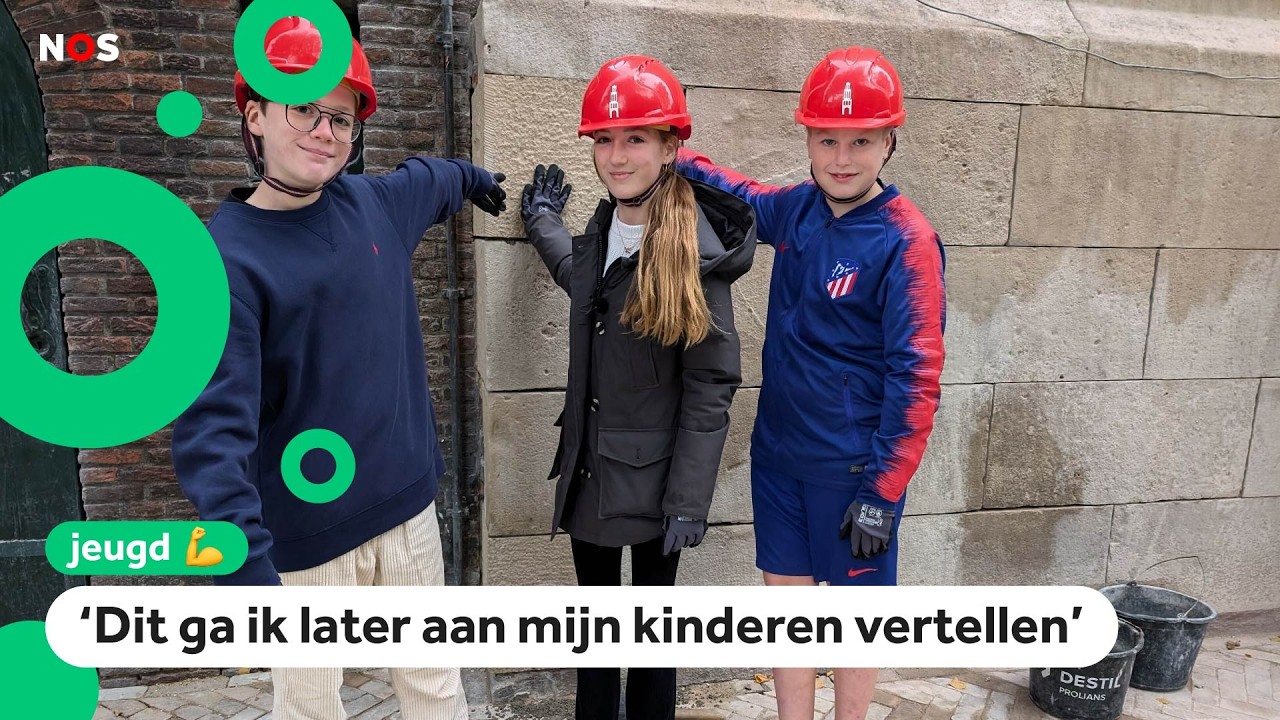 Teun, Iza en Seb leggen laatste steen van opgeknapte Domtoren