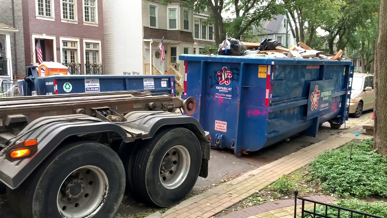 Construction dumpster skip pick up - truck collection