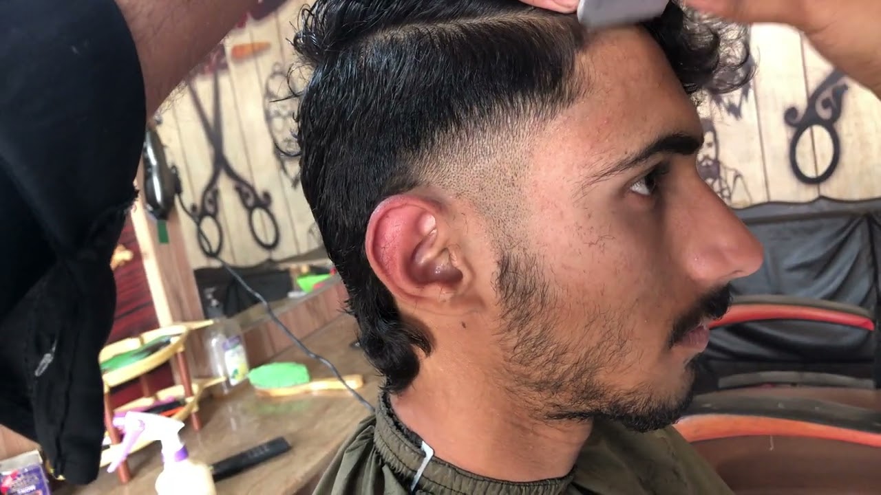 Wolf  hair cut side part hairstyle long hair nika barber 