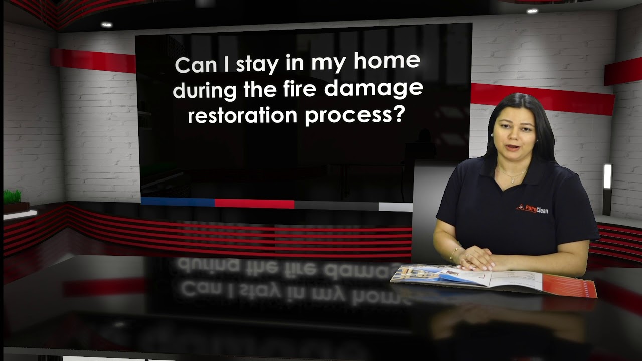 Can I stay in my home during the fire damage restoration process?