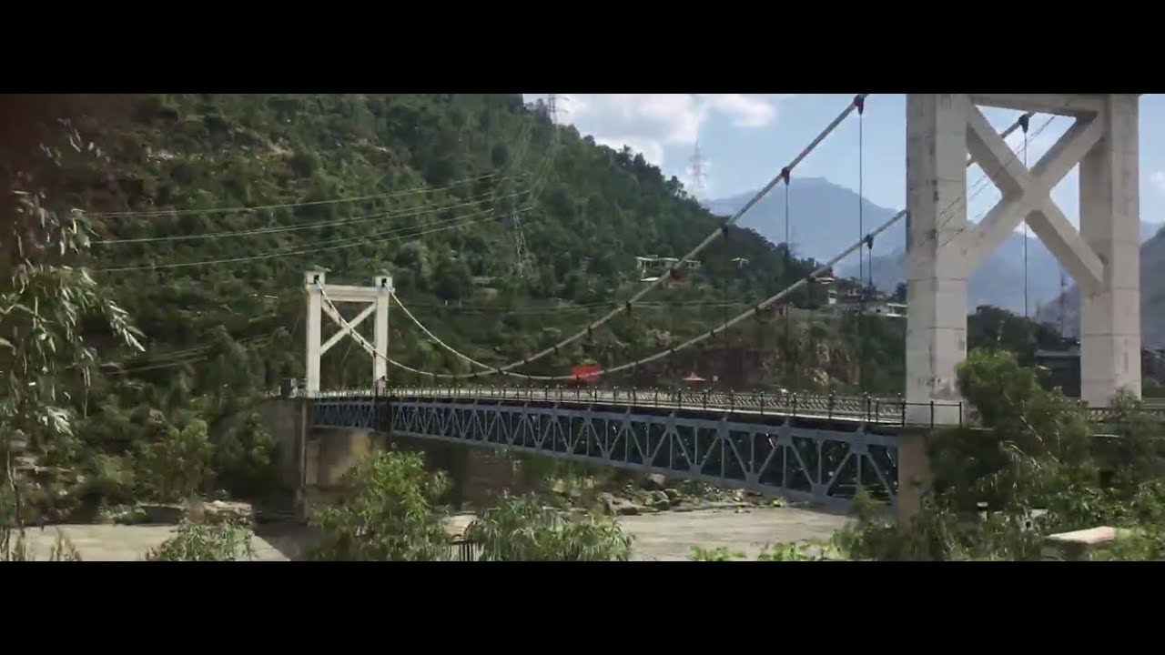 Indus River Bridge on Karakoram Highway between the mountains near Thakot