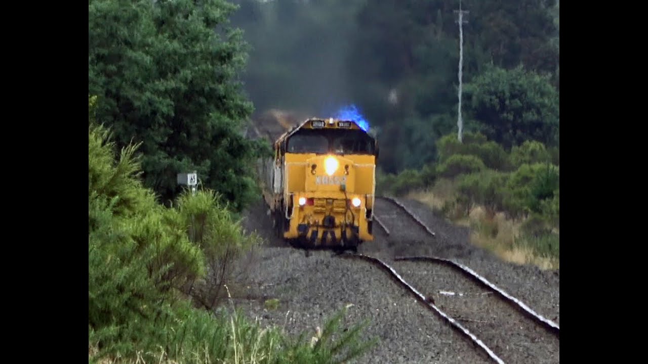 A Fiery XR Diesel Locomotive hauling a late Running Grain Train.