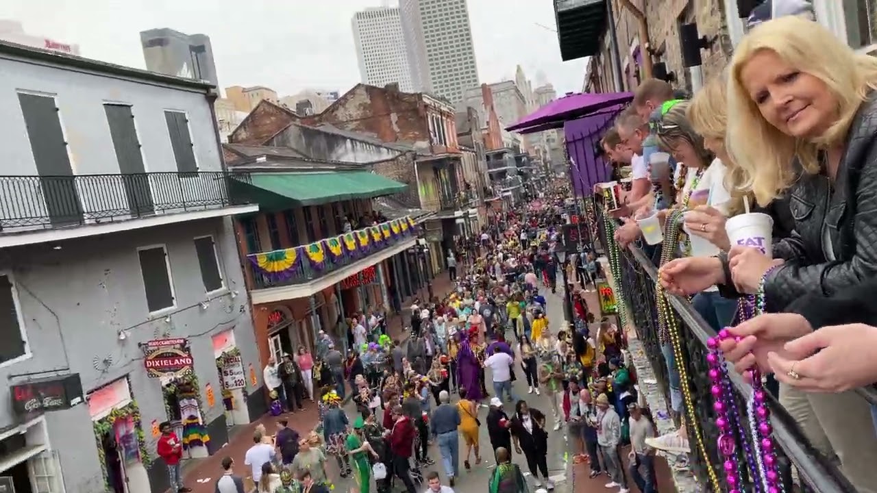 On the balcony at Mardi Gras ￼