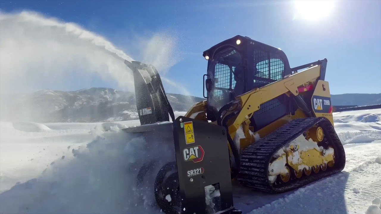 Cat&reg; High Flow SR321 Snow Blower at Work