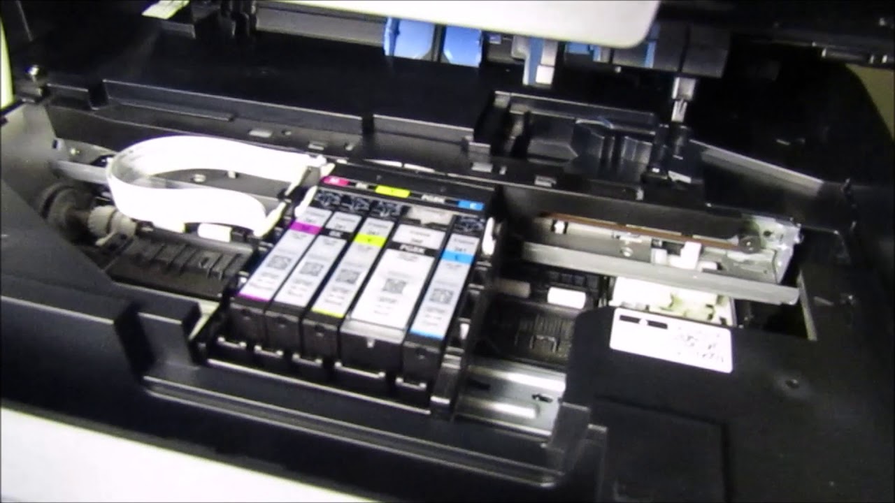 Jak zainstalować tusz w urządzeniu Canon TR8520