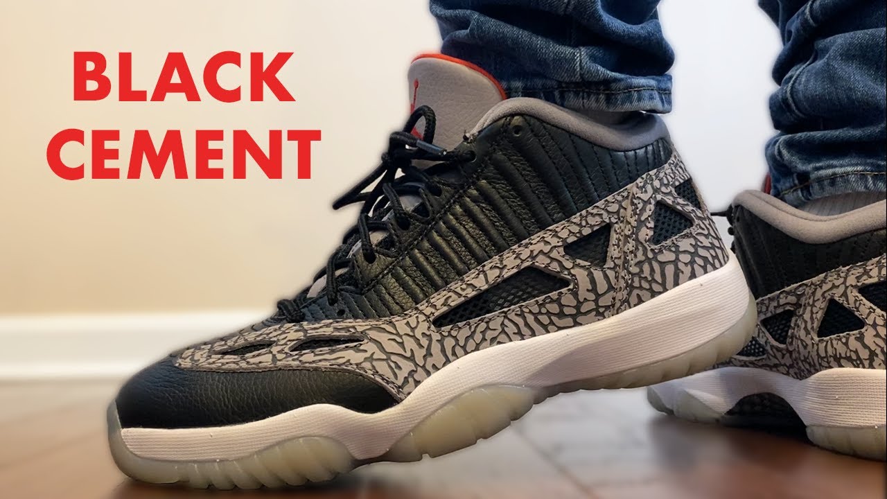 The JORDAN 11 LOW BLACK CEMENT is UNEXPECTED HEAT ON FEET!