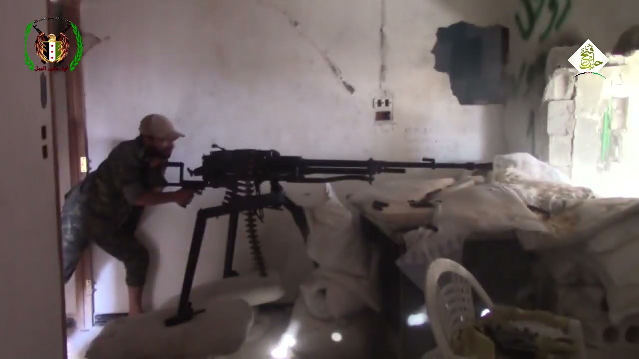 FSA fighters pepper Syrian Army positions with a HMG in Ramouseh, Aleppo - 2016