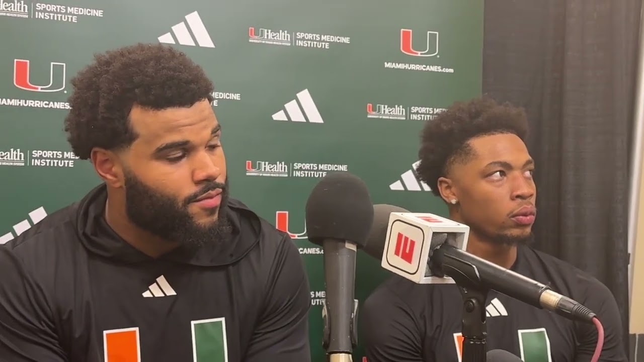 Убежавший игрок Miami Hurricanes CJ Daniels и ди-энд Акхим Месидор после перехода в Florida State