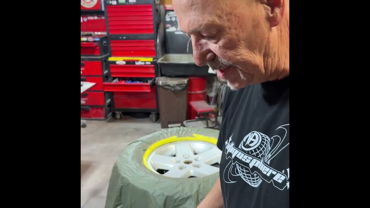 Garage life.  Episode 12.  Refinishing stock alloy rims on a Jeep