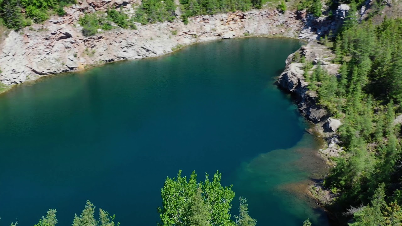 Amazing Quarry with Sunken Trees in Beautiful Blue-Green Waters