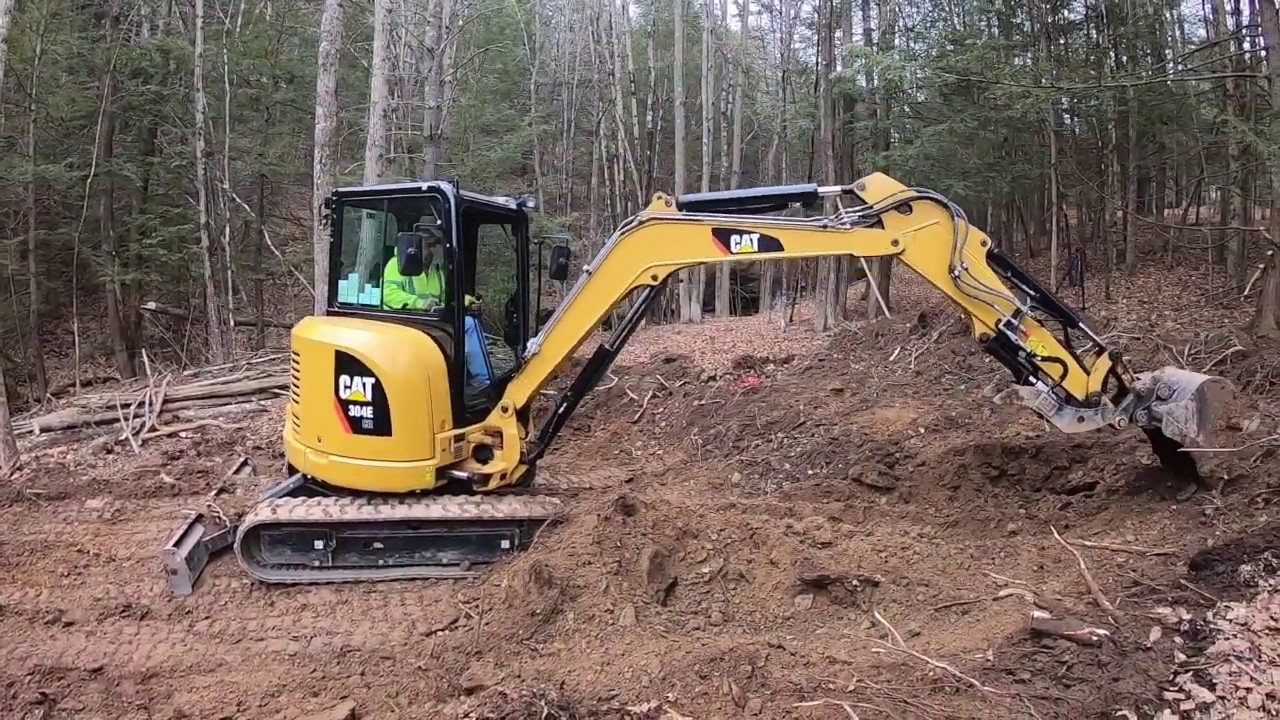 Mini Excavator Installing Driveway At Hunting Camp