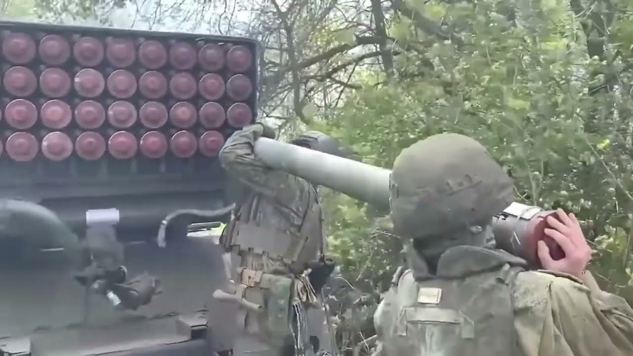 Russian Soldiers using a BM-21 Grad Rocket Launcher to attack Ukrainian positions