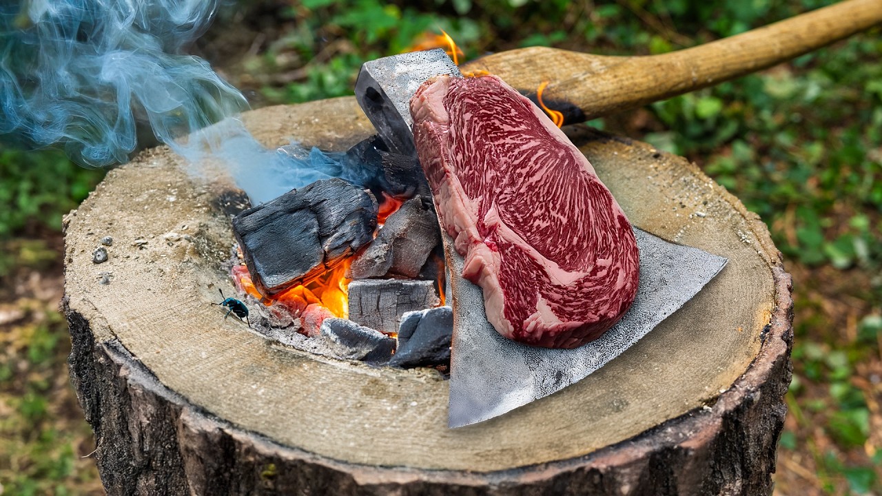 Cooking Ribeye Steaks on a Hot Axe Blade Deep in the Forest