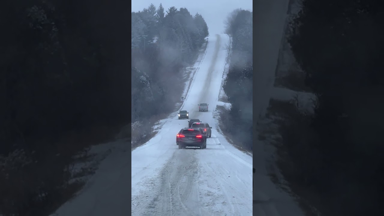 Drivers Work Together to Overcome Icy Hill Conditions