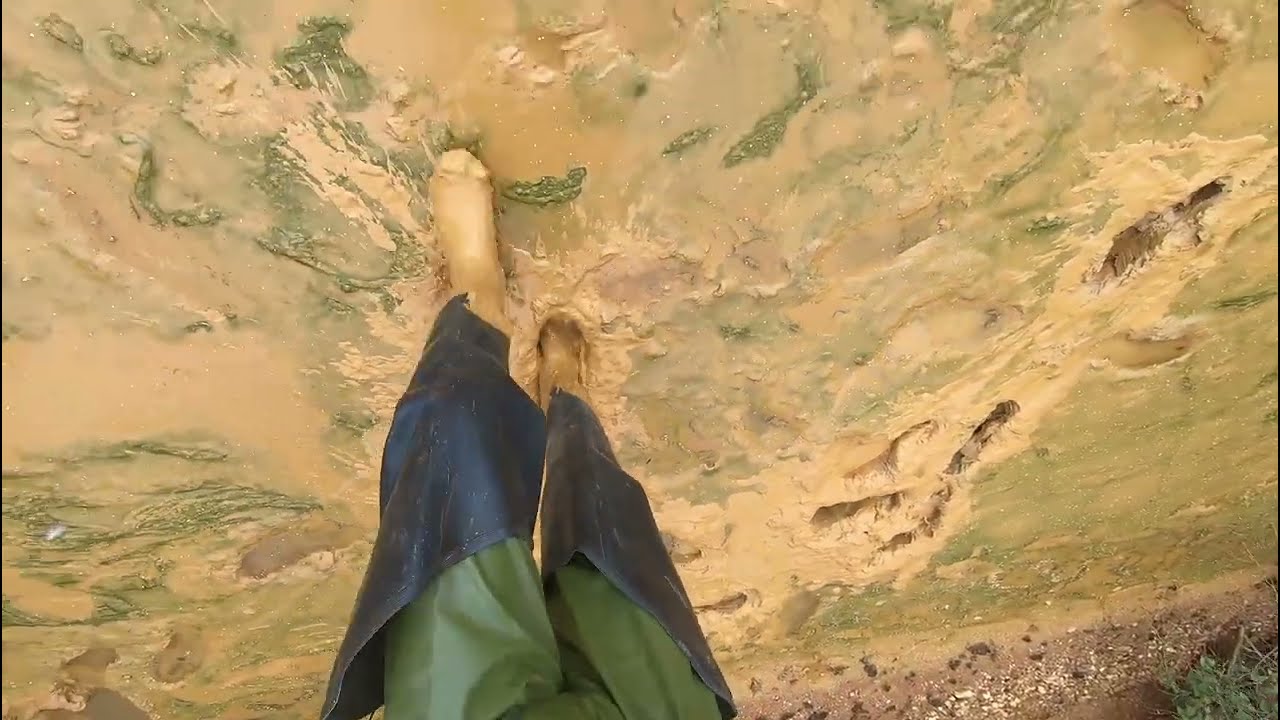Waders and rubber rainwear in mud + Zodiac suit mud jump