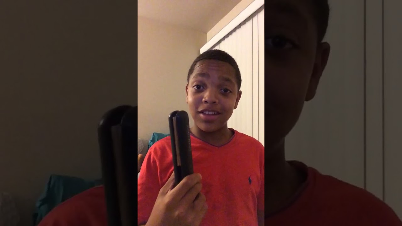 Kid playing with moms flat iron burns his tongue!
