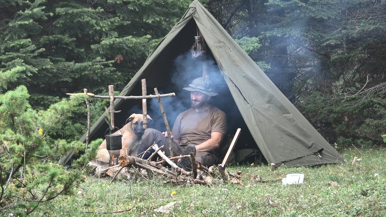 bushcraft trip at 1500 meters in a kanvas tent. Making a Adjustable Pot Hanger cooking over the fire
