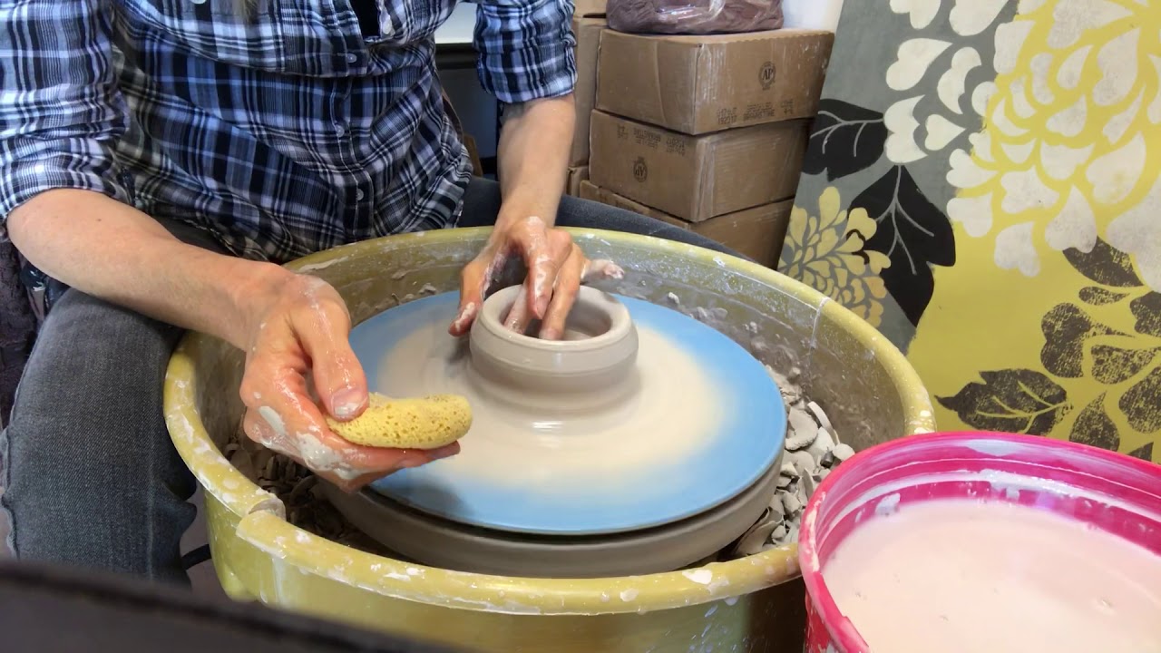 First pottery class.  How to throw a cup on the wheel. Basic pottery skills.