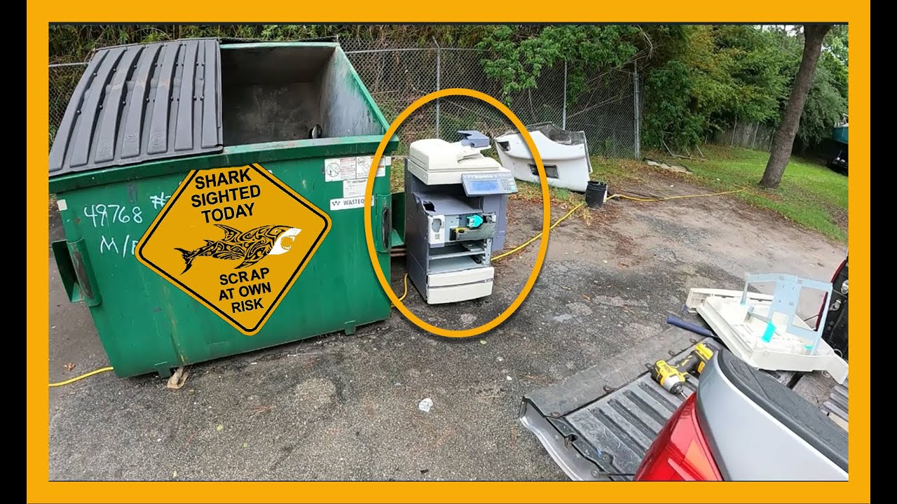 Ewaste scrapping a big printer at the dumpster