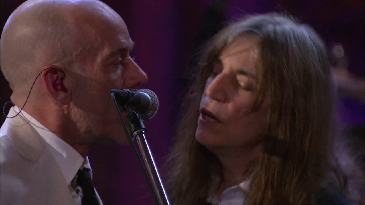 R.E.M., Patti Smith perform 