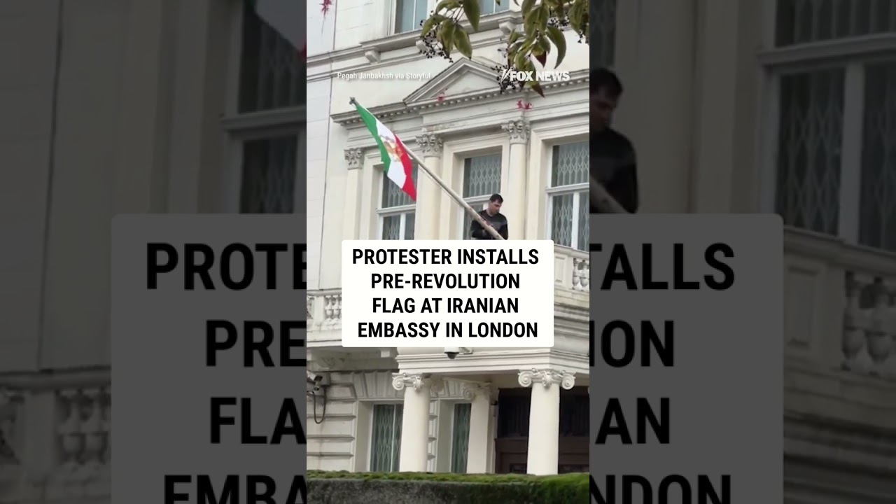 WATCH: Protester installs pre-revolution flag at Iranian embassy in London #foxnews #news #shorts