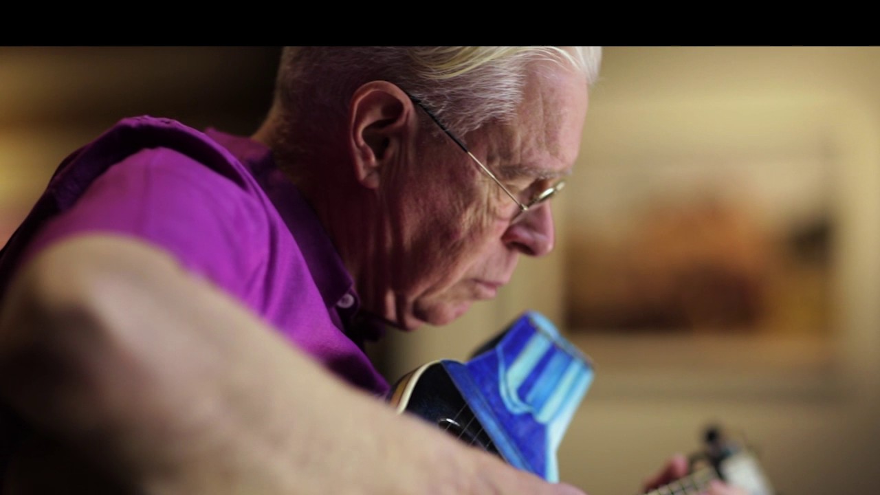 Bruce Cockburn playing a Linda Manzer Guitar
