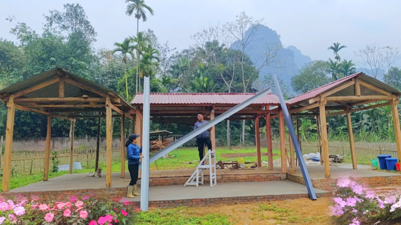 CUONG & LAN eagerly installed the water trough, and asked TU for some flower cuttings to plant.