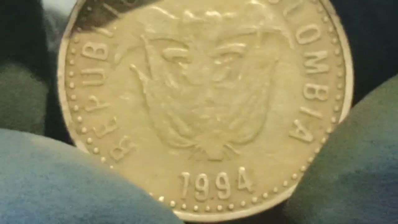 🇨🇴  👉  100 PESOS 1994 PARTE SUPERIOR DEL CANTO SIN ESTRIADO 👀 PUEDE SER 🫰 💲💰👁