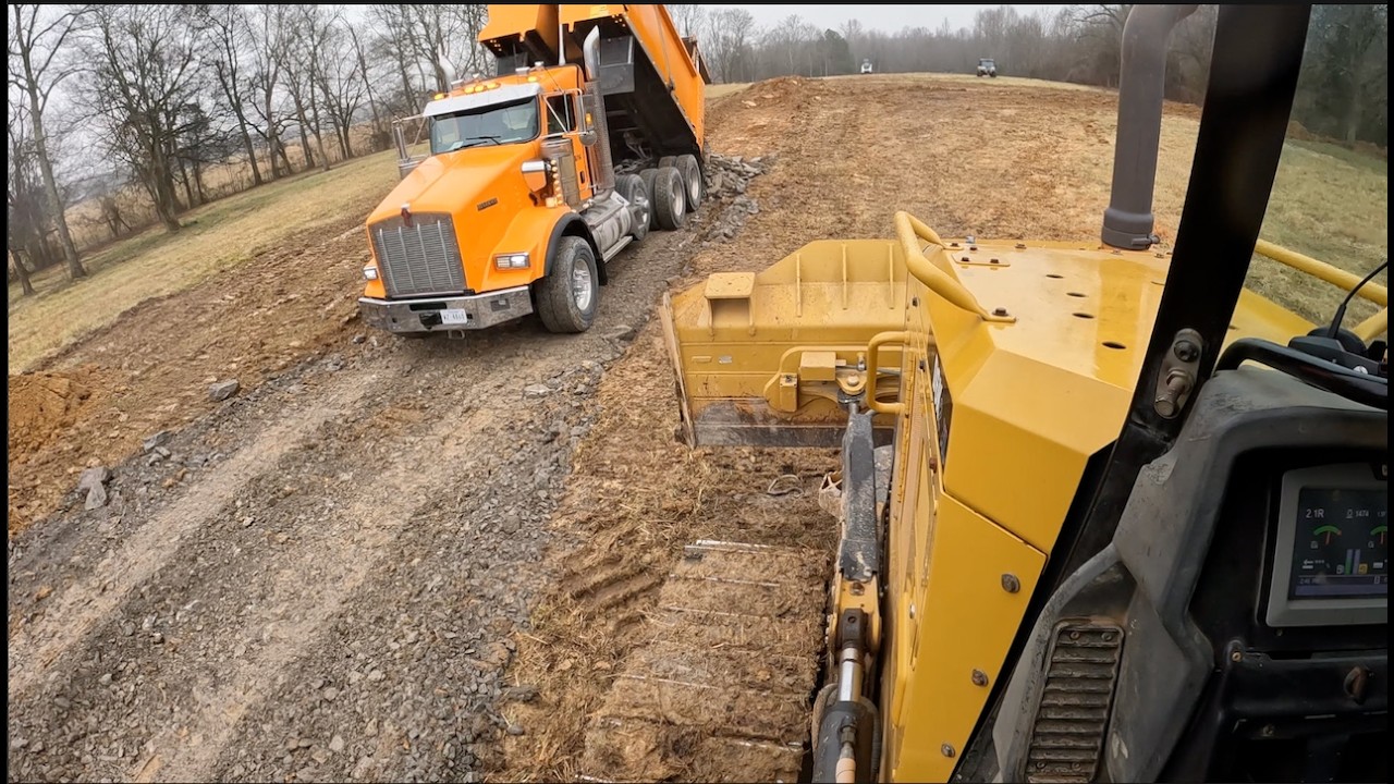 Major soft spots in this road = tons of shot rock!