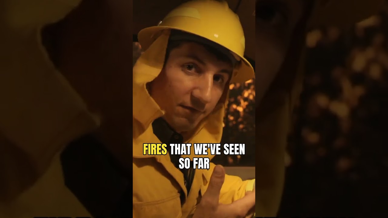 A news crew flees as explosive crown fires race across the 2013 Rim Fire frontline.