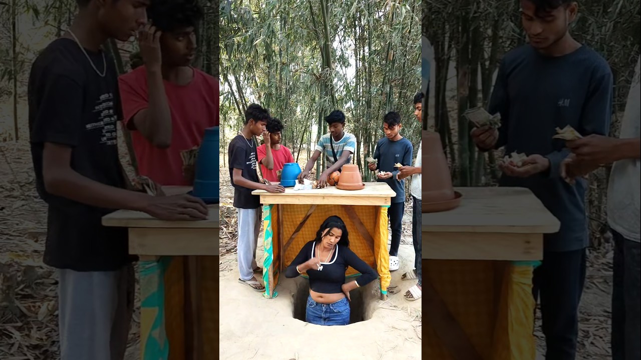 The amazing girl is standing under the technique table and earning money.