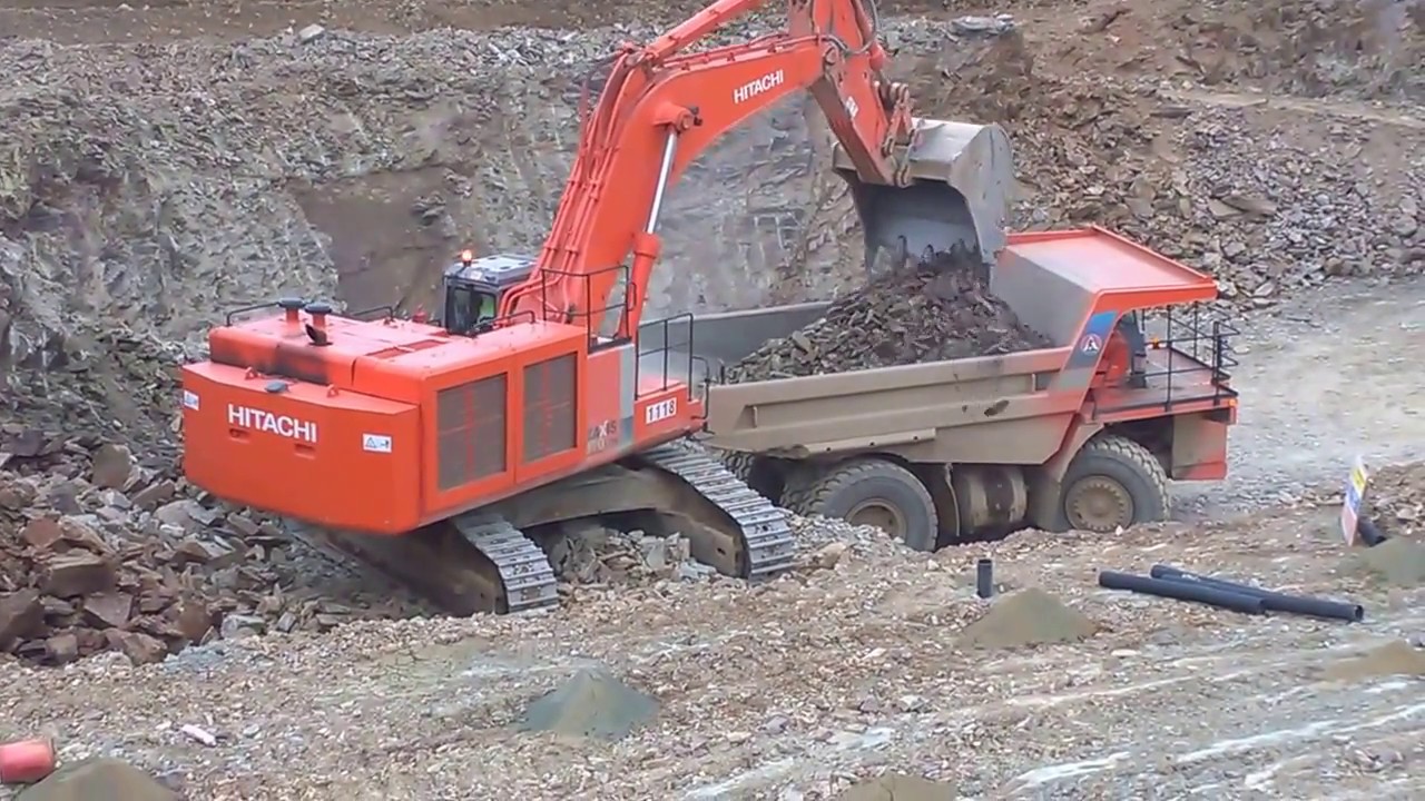 Hitachi Zaxis 870 LCH excavator loading blasted rock (part 2)