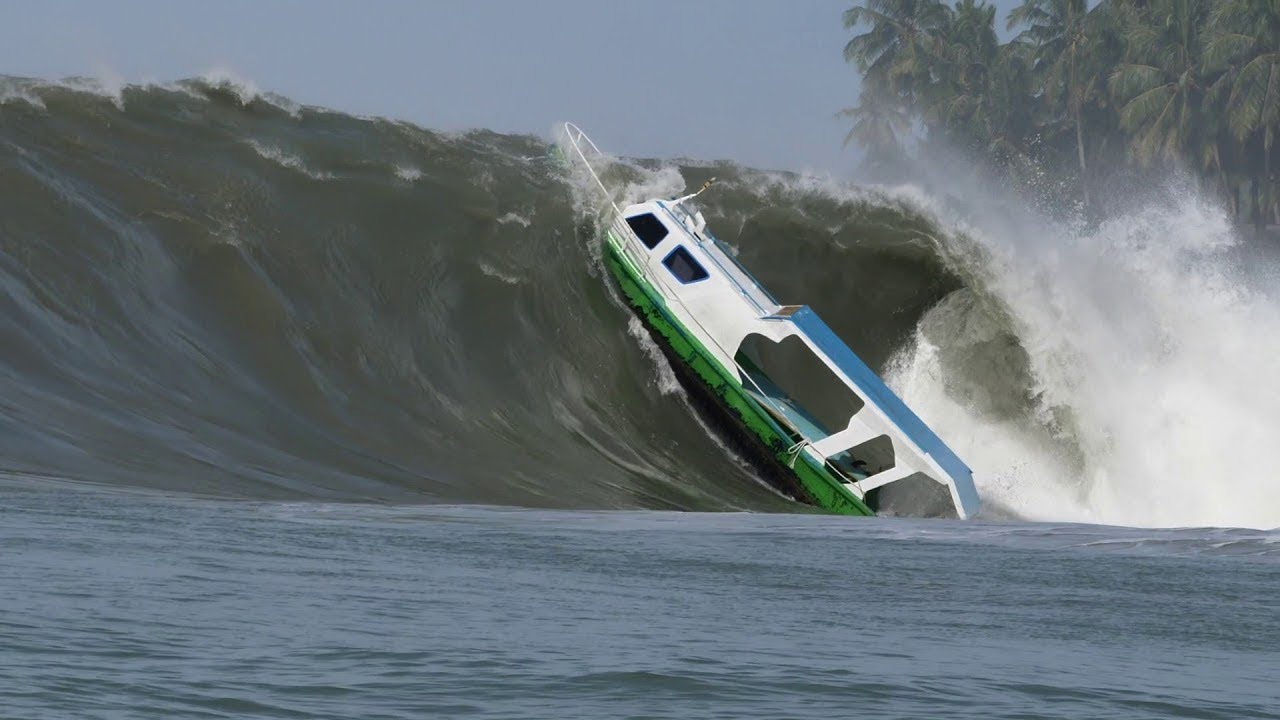 Boat Gets Sucked in by Massive Wave || ViralHog