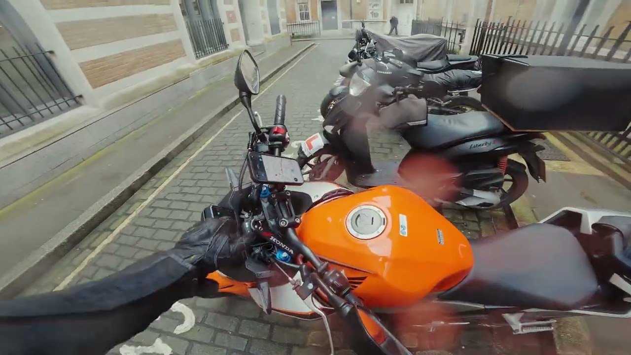 Riding through London in the rain