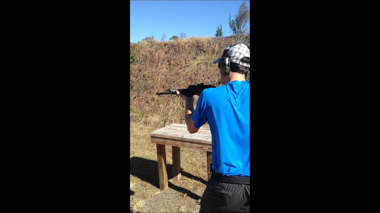 Chad Kiehn having fun at the range with an AR15 bump fire stock.