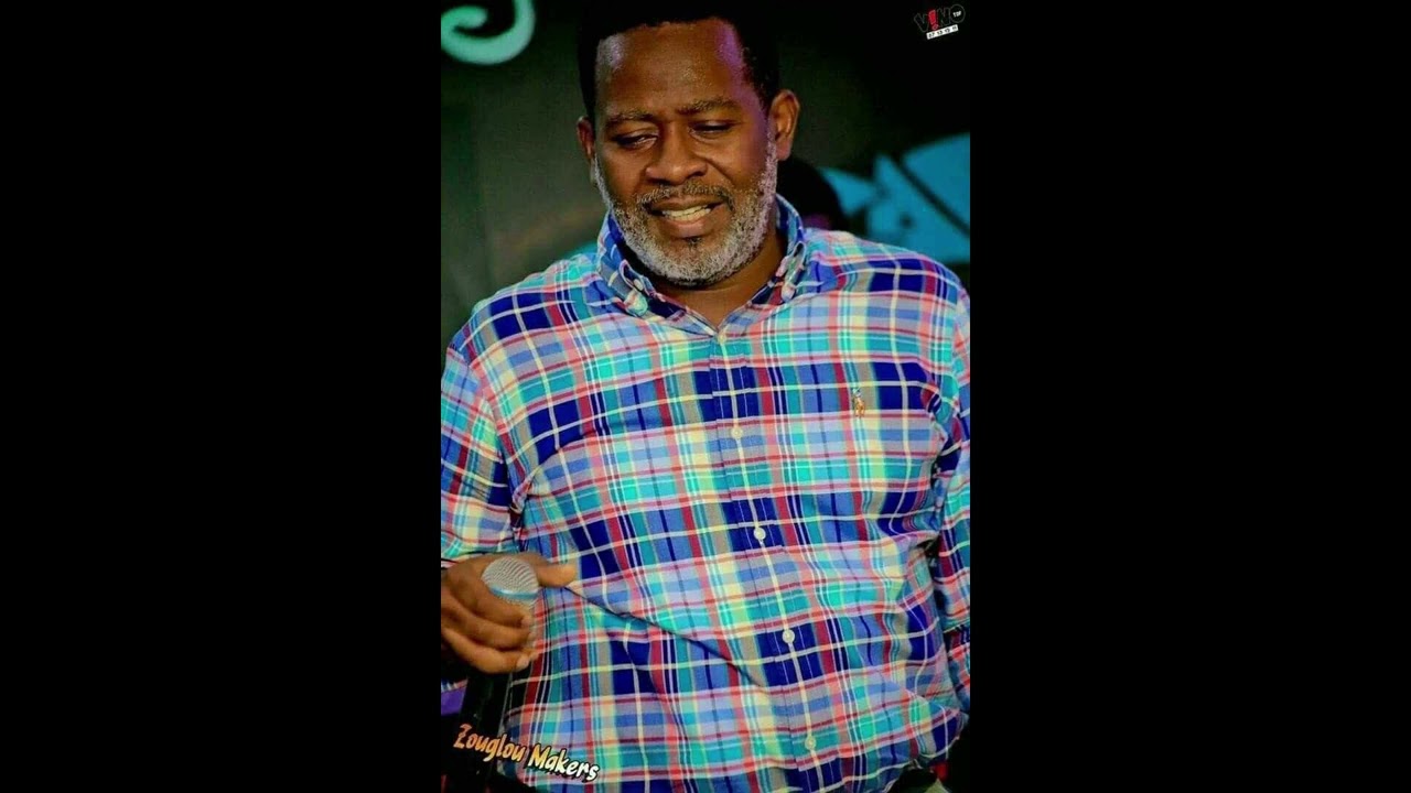 HOMMAGE A JEAN ROGER ADOM- mp3