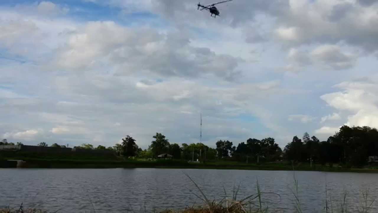 Dark cyclic Gaui X3 fly over water by MC.TGN