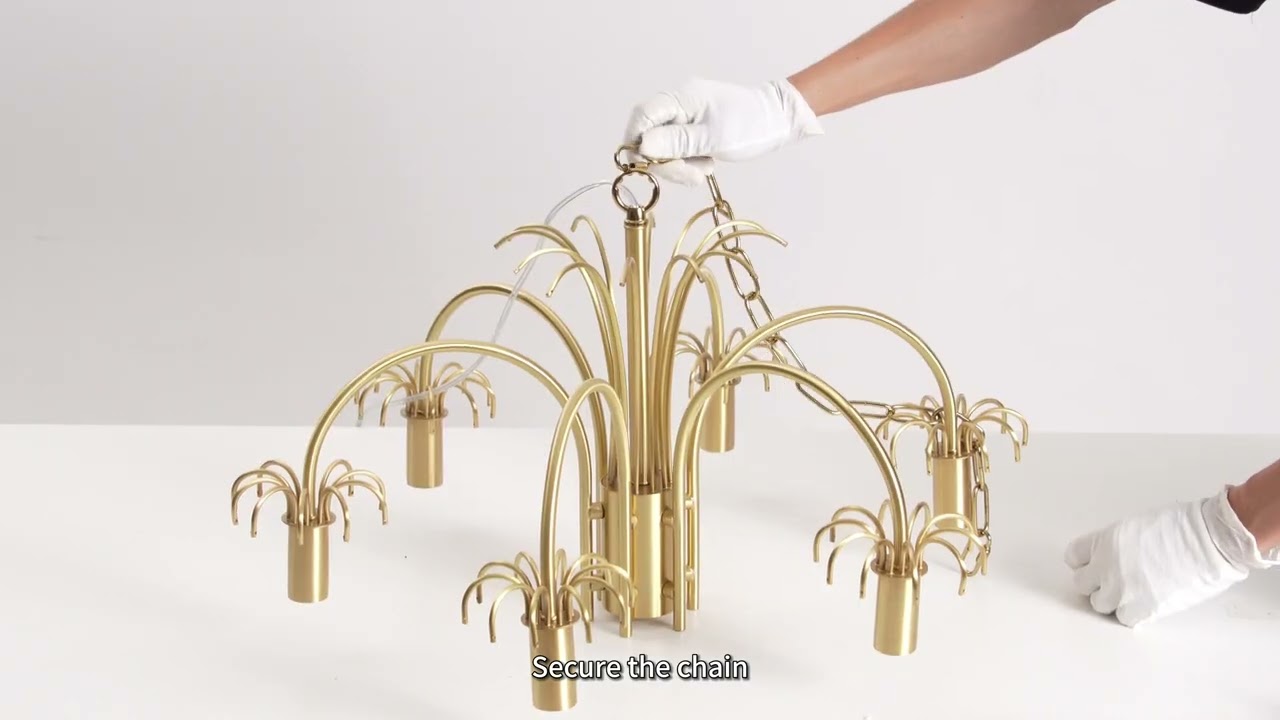 Isla Dawn Chandelier Installation Video - Elegant Modern Lighting in Crystal and Brass