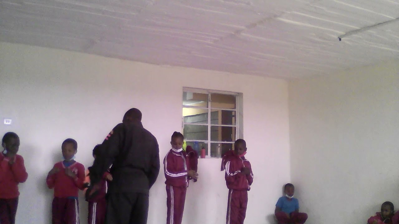 Daniel school Kenpo karate kids class pad work session