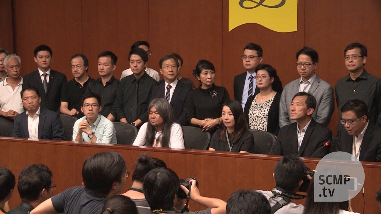 Four more Hong Kong lawmakers disqualified over oath-taking controversy