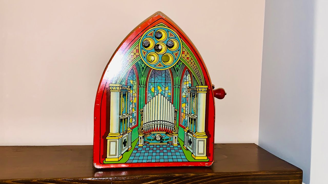 J. CHEIN AND CO HAND CRANK TIN LITHO TOY ORGAN