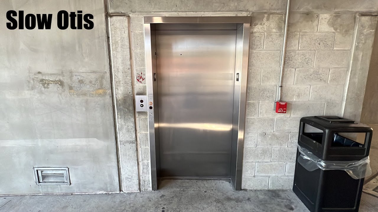 SLOW Glass Otis Elevators at North Beach Parking in Clearwater, FL