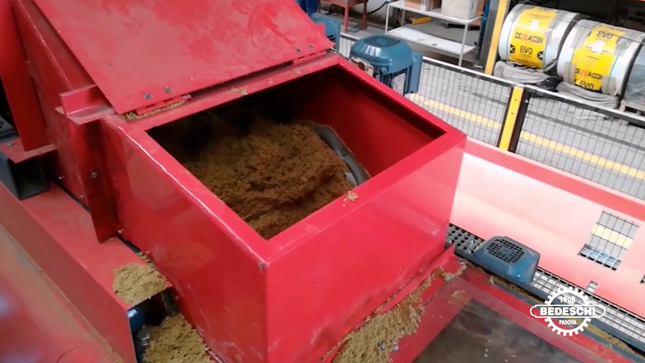 Bedeschi - System for bricks filling with rock wool granulate