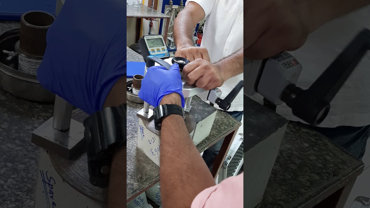 Pull off test on water proofing coated concrete cube