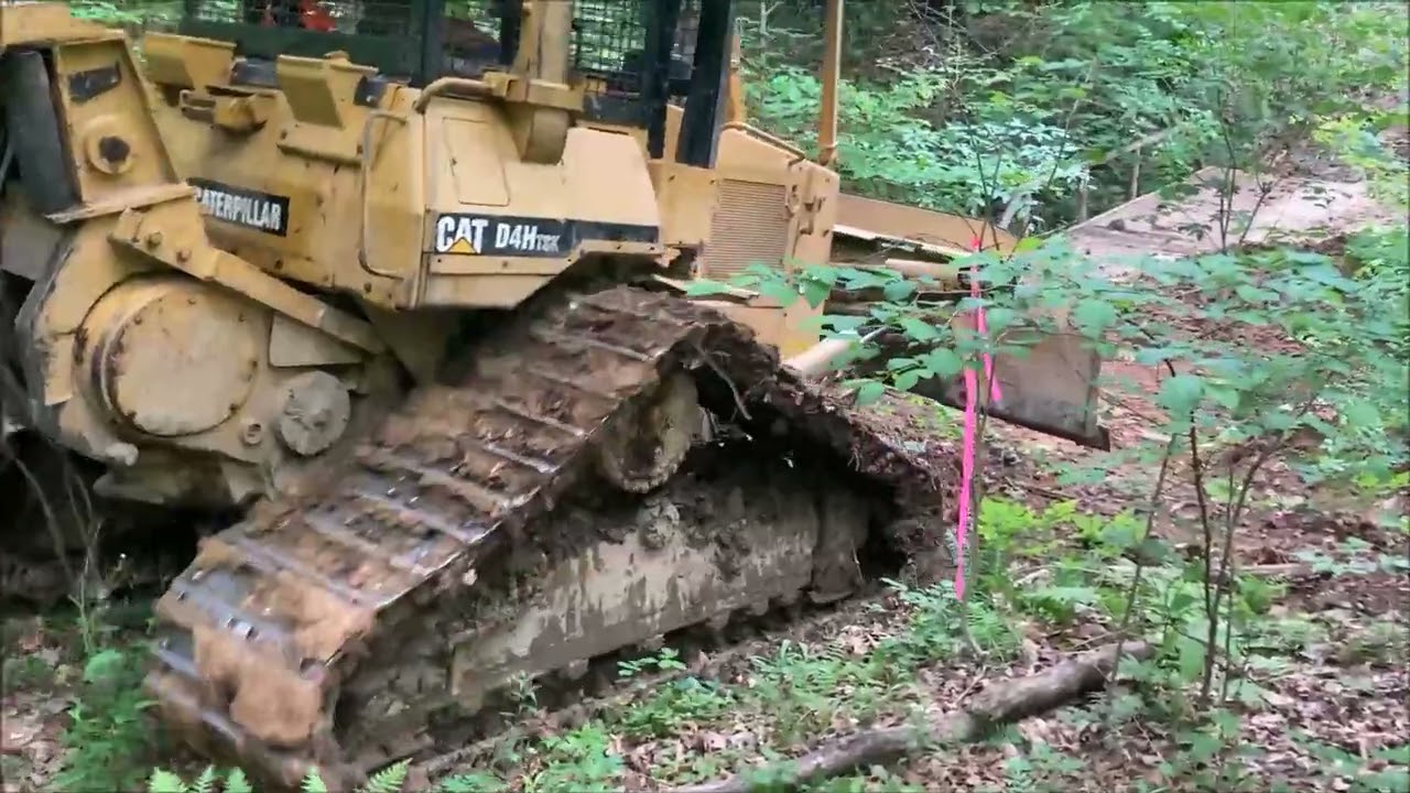 Bridging a small runoff with a D4TSK Dozer and pullin the first drag