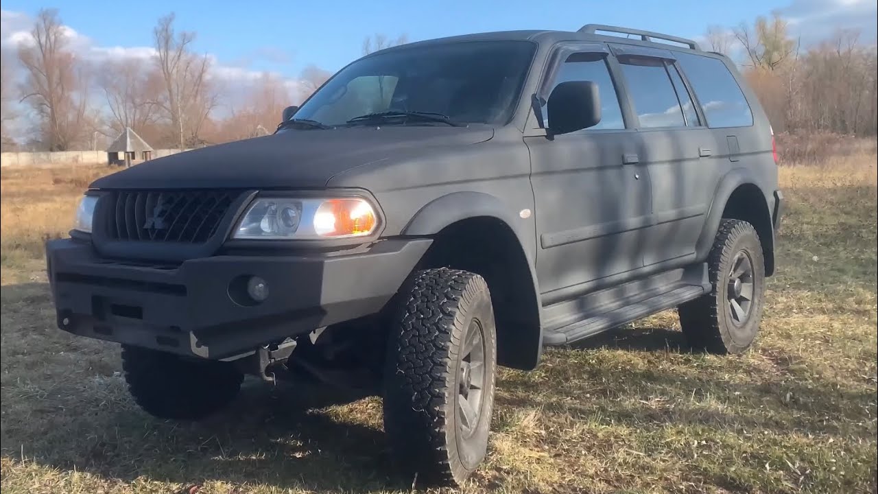 Mitsubishi pajero sport 1 paint in Raptor color black
