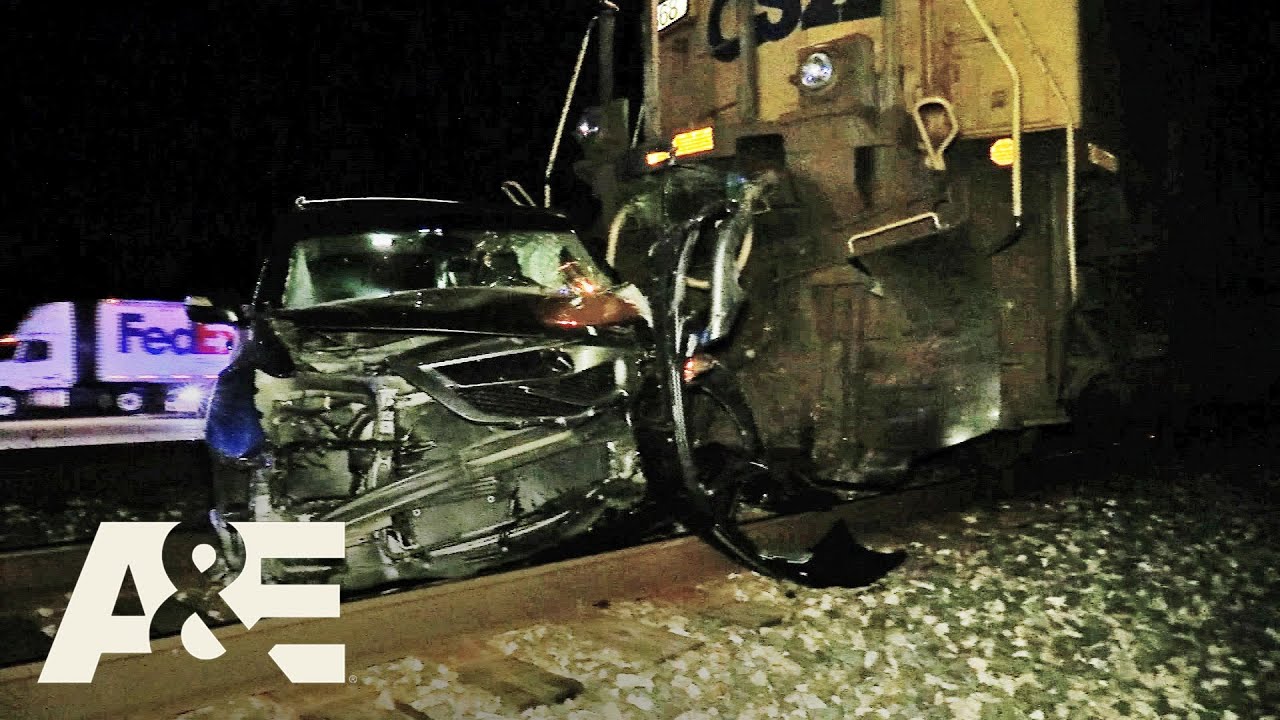 Police Respond to Train-Car Crash After Car Gets Stuck on Tracks | Live PD: Police Patrol | A&E